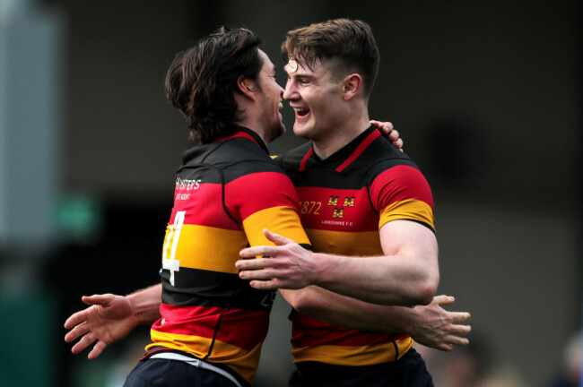 Daniel McEvoy celebrates scoring a try with Peter Sullivan