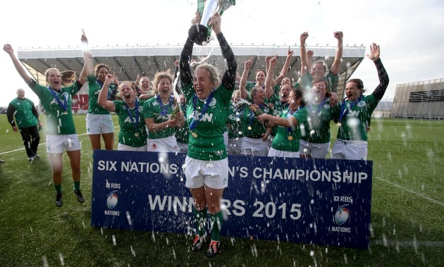 Niamh Briggs lifts the cup as the Irish players celebrate