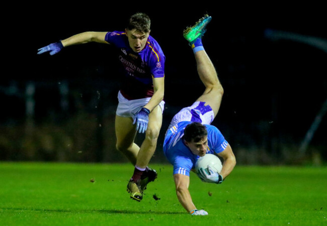 Brian Howard is tackled by Eoghan Lawless