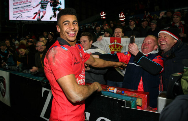 Robert Baloucoune celebrates after the game with fans