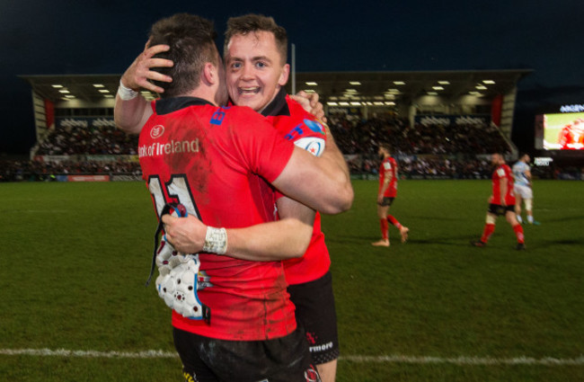 Jacob Stockdale celebrates at the final whistle with Michael Lowry