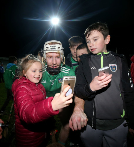 Cian Lynch takes a selfie with a fan after the game