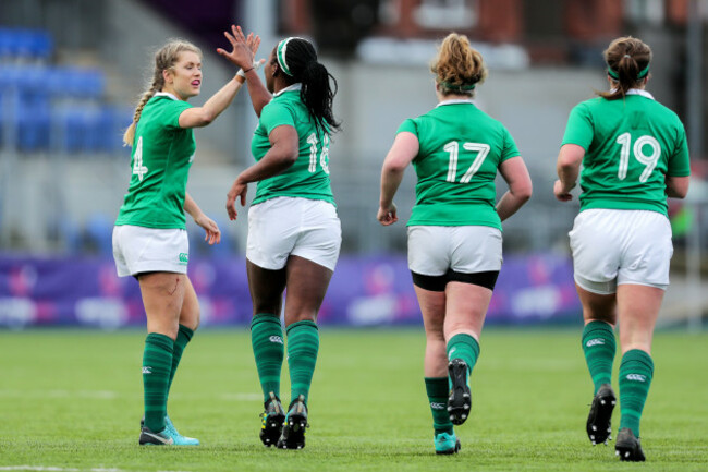 Linda Djougang celebrates scoring a try with Megan Williams