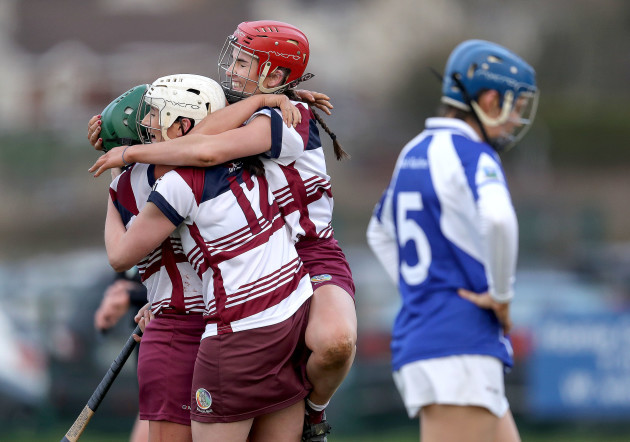 Shannon Graham, Siobhan Bradley and Faoiltiarna Burke celebrate at the final whistle
