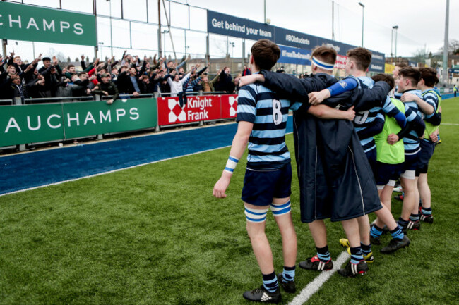 Castleknock players celebrate with the supporters