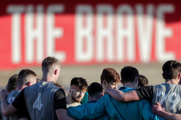 Players huddle during the training