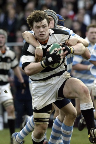 Cian Healy of Belvedere is tackled