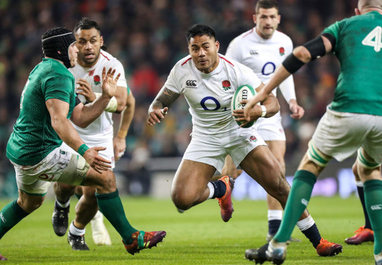 Manu Tuilagi with Ireland's CJ Stander