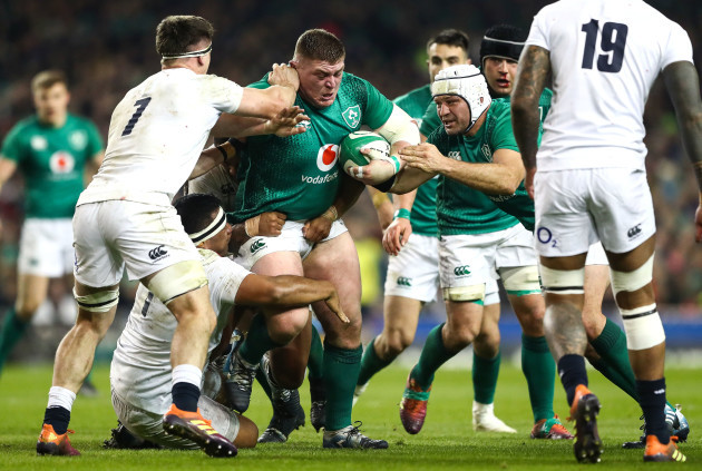 Tadhg Furlong is tackled by Mako Vunipola and Tom Curry