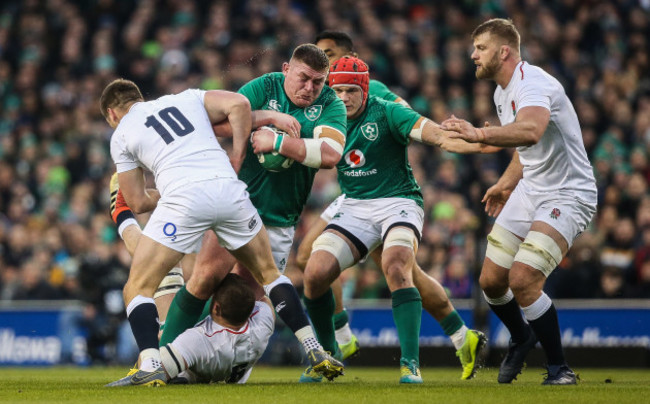 Tadhg Furlong tackled by Owen Farrell and Kyle Sinckler