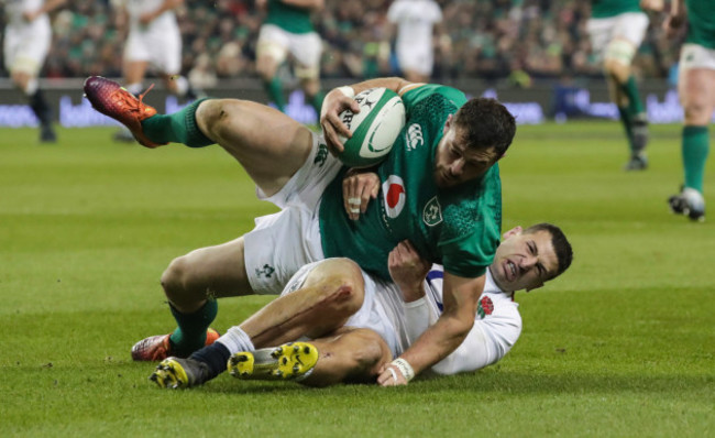 Robbie Henshaw tackled by Jonny May