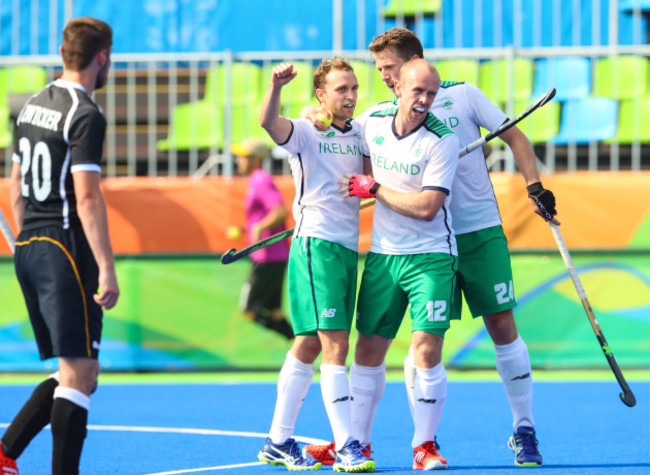 Michael Darling celebrates scoring their second goal with Eugene Magee