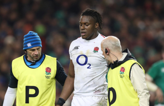 England's Maro Itoje goes off injured with Bob Stuart