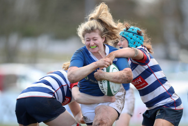 Emma Hooban is tackled by Ann Marie Rooney and Rose Alice Murphy