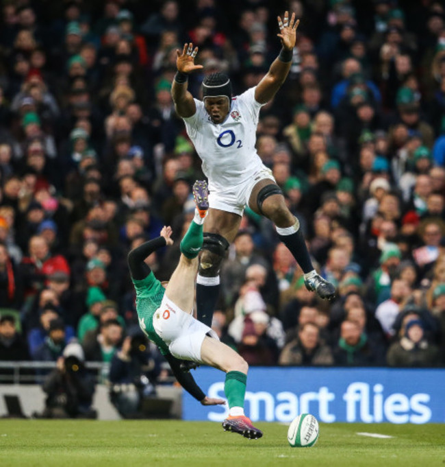 Maro Itoje collides with Keith Earls