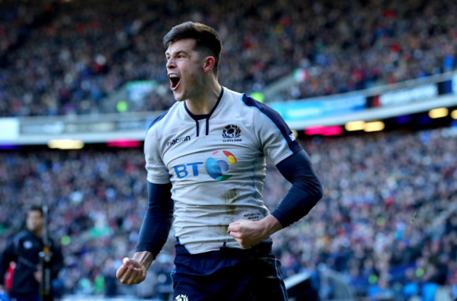 Blair Kinghorn celebrates scoring the first try