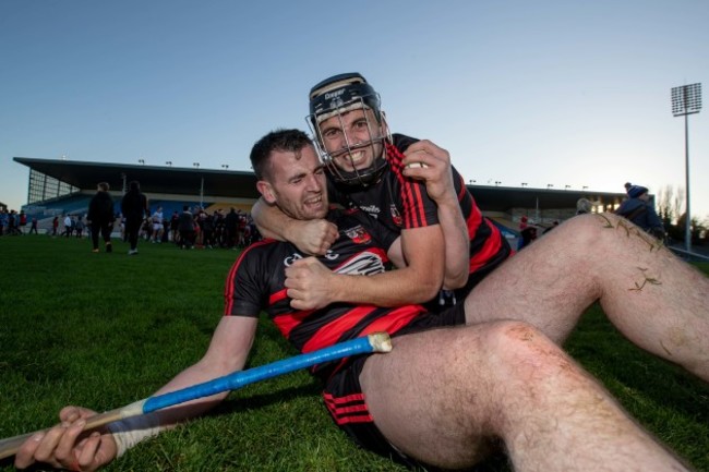 Wayne Hutchinson celebrates the final whistle with JJ Hutchinson