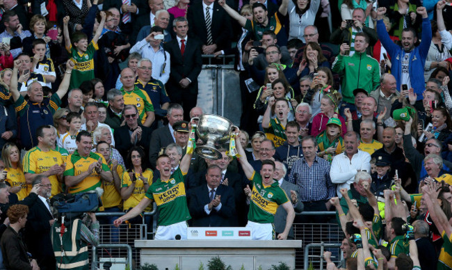 Fionn Fitzgerald and Kieran O'Leary lift The Sam Maguire cup