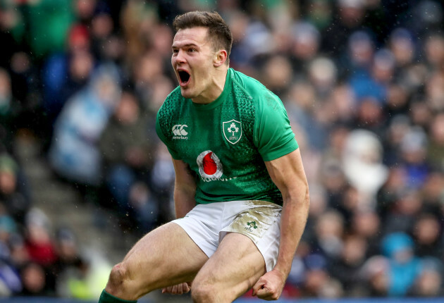 Jacob Stockdale celebrates scoring a try