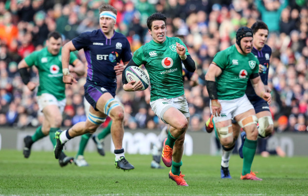 Joey Carbery makes a break in the lead up to Keith Earls try