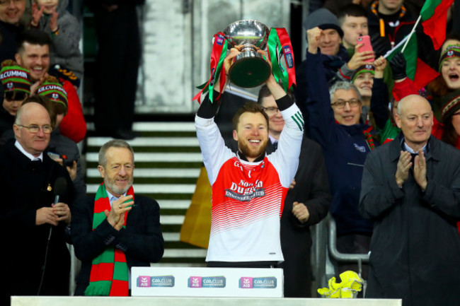 Brendan Kelly lifts the trophy