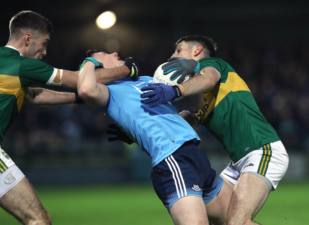 Adrian Spillane and Paul Geaney tackle John Small