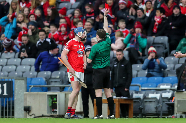 Jack Doyle receives a red card from Colum Cunning