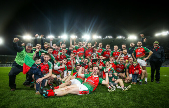 Kilcummin celebrate with the trophy after the game