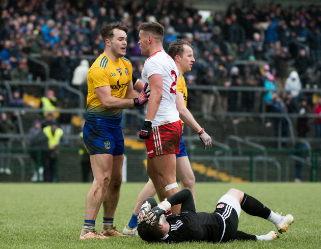 Michael McKernan has words with Ultan Harney after a clash with Niall Morgan