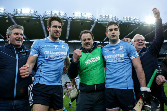Gerry McInerney celebrates with Gearoid McInerney and Sean McInerney