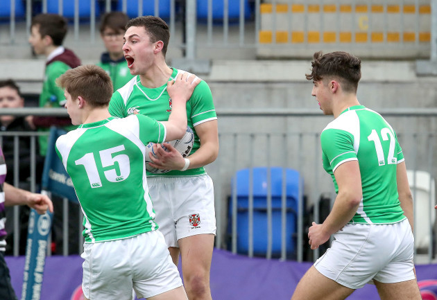 Fergus O hOisin celebrates scoring a try with Conor Hennessy