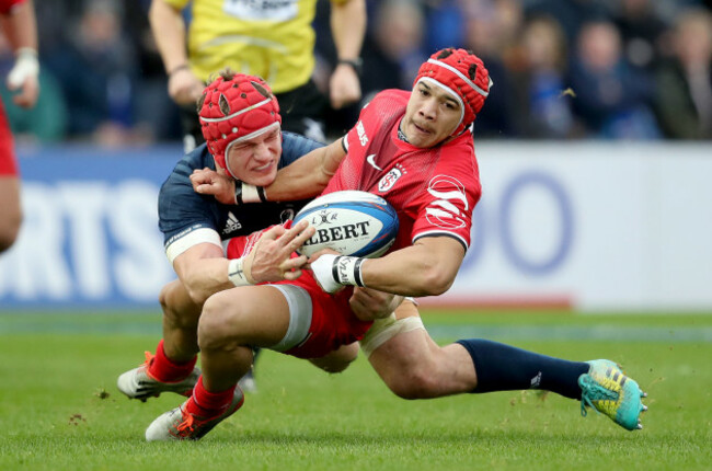 Yoann Huget is tackled by Josh van der Flier