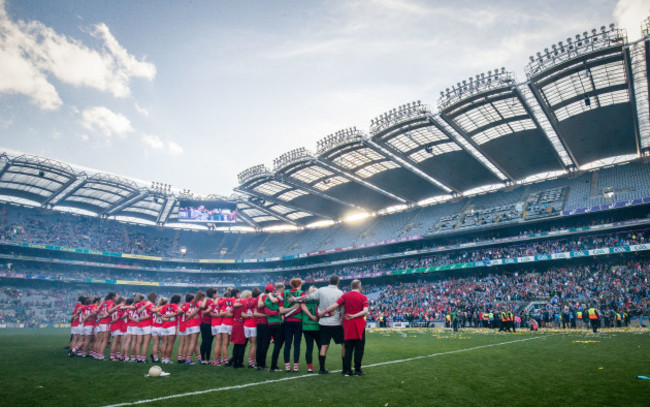 The Cork team stand during the trophy presentation