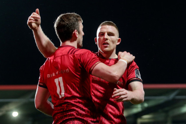 Darren Sweetnam celebrates scoring a try with Andrew Conway