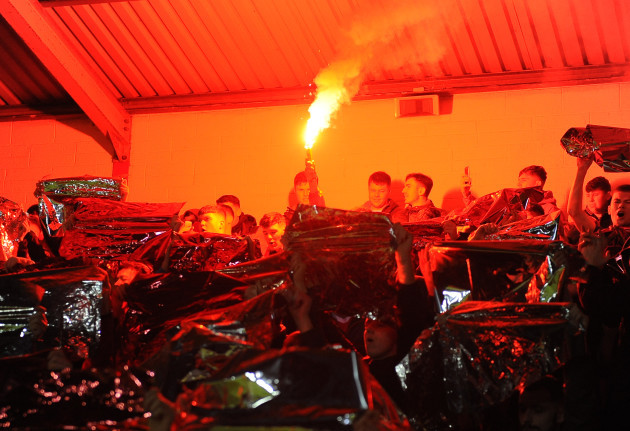 St Patrick's Athletic supporters light a flare