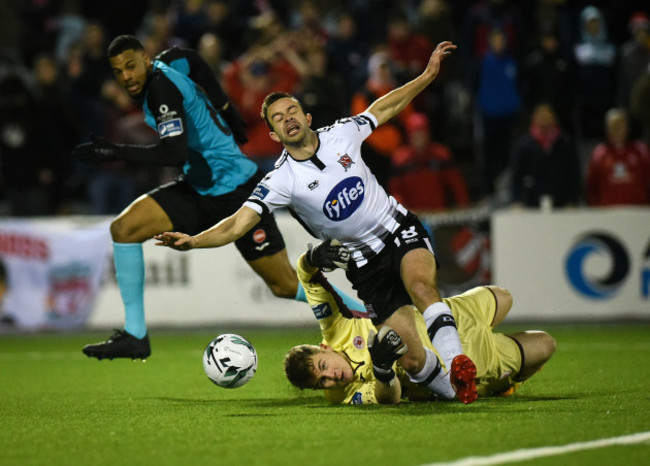 Robbie Benson is fouled by Sligo Rovers goalkeeper Edward McGinty