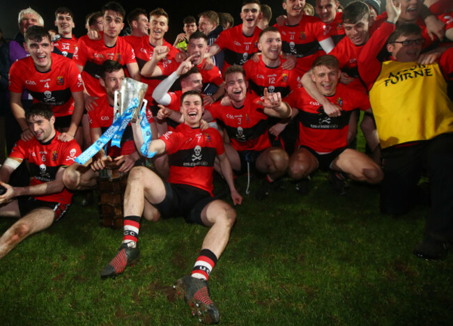 Cian Kiely celebrates with the trophy