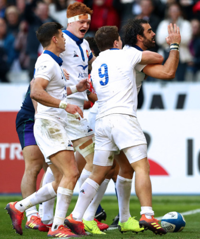 Yoann Huget scelebrates scoring their second try with teammates