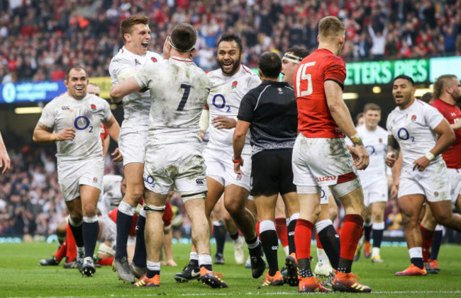 Tom Curry celebrates scoring their first try with Henry Slade and Billy Vunipola