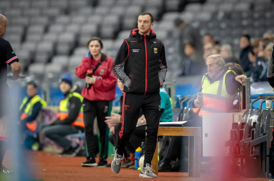 Keith Higgins watches the ladies game