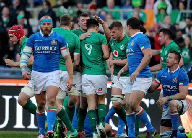 Conor Murray celebrates his try with Peter O'Mahony and Jordi Murphy