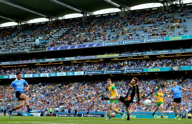 Niall Scully scores his second goal past goalkeeper Shaun Patton