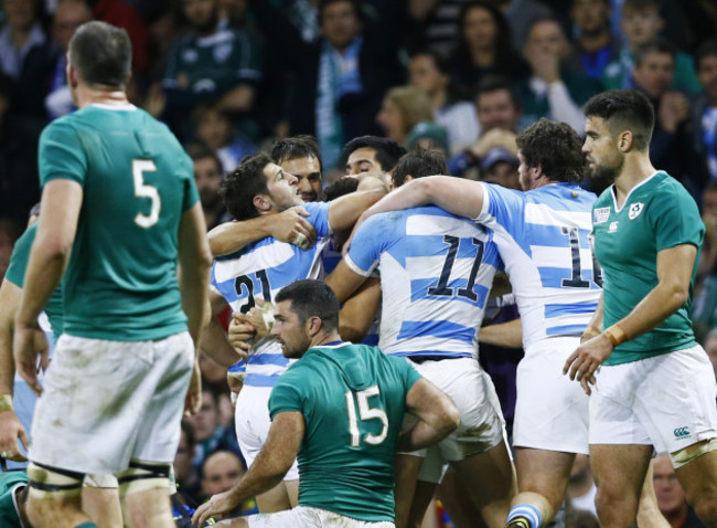 Joaquin Tuculet celebrates his try with teammates