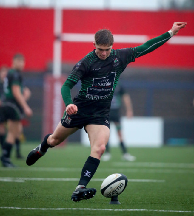 Jack Crowley kicks a conversion