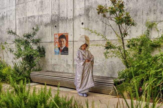 JAPAN - WOMAN WEARING A WEDDING DRESS