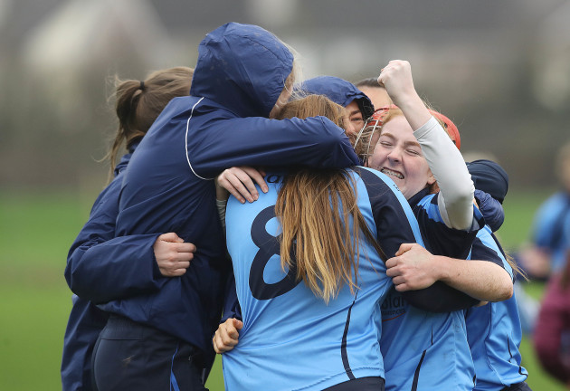 Gailltir players celebrate at the final whistle