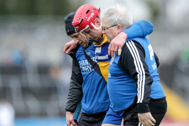 John Conlon leaves the game with an injury