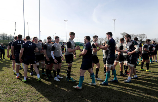 The Ireland senior and under 20 teams shake hands