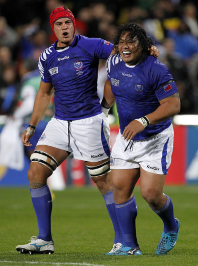 Daniel Leo and Census Johnston celebrate a try