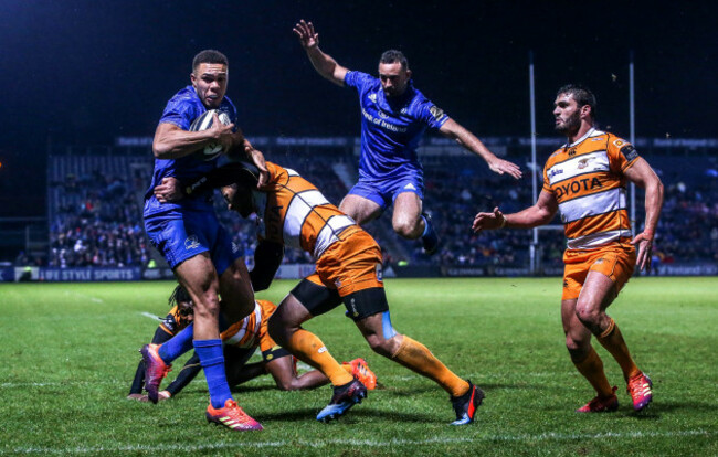 Adam Byrne on his way to scoring a try